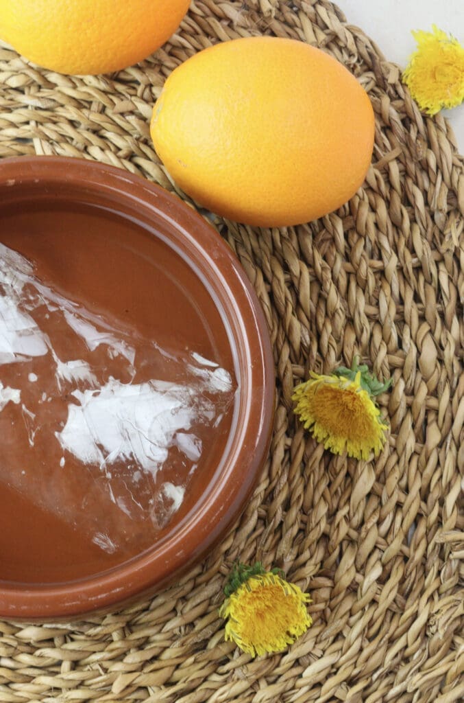 image showing how to soak gelatine sheets in cold water